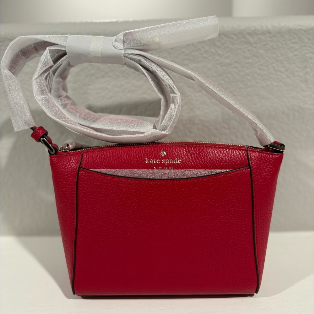Kate Spade Red Crossbody Bag with Minimalist Design